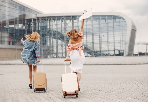 two-beautiful-girls-standing-by-airport